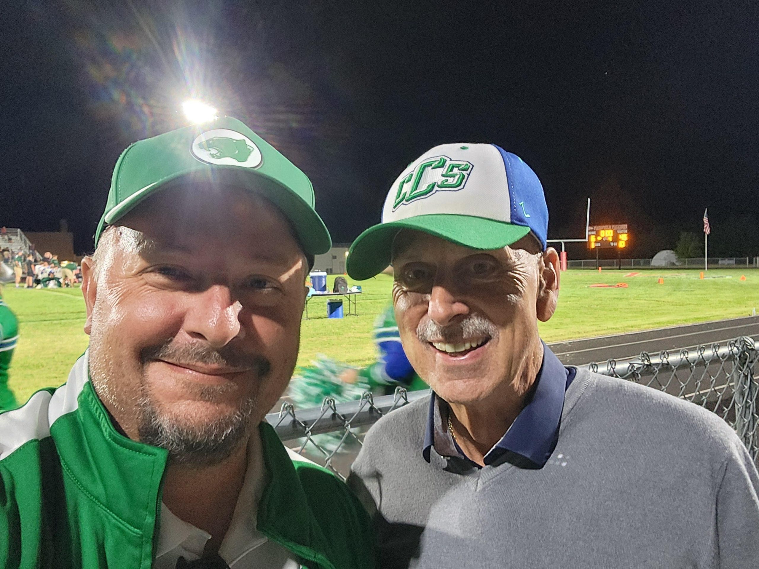 Richard Jolly, owner of Leyton House, attends his first American football game with COO Bart Kooiman